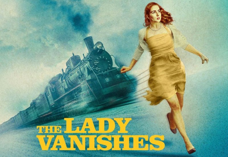 The Lady Vanishes poster - Lady in yellow dress running ahead of a train