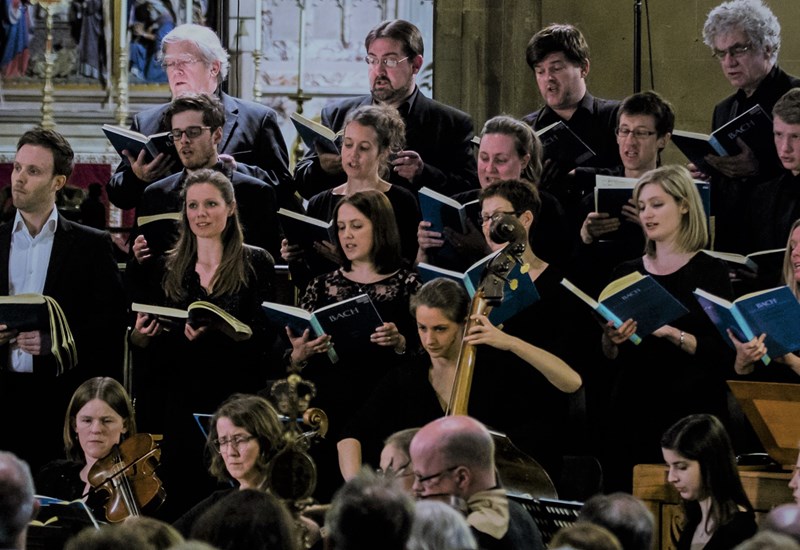 An image of a choir & musicians rehearsing  