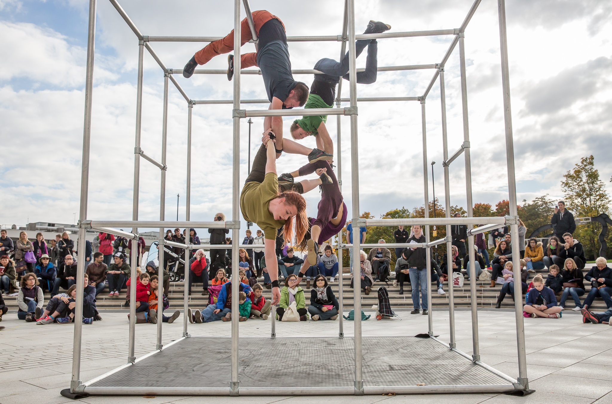 Captive performed in a town centre in front a watching audience