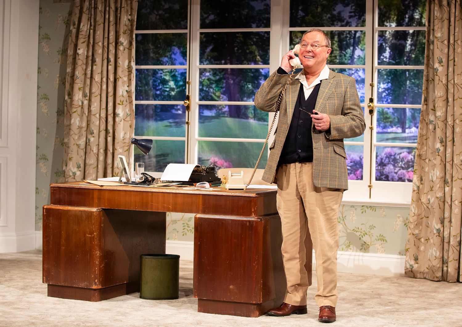 Robert Daws on the telephone in his office playing the role of P.G Wodehouse